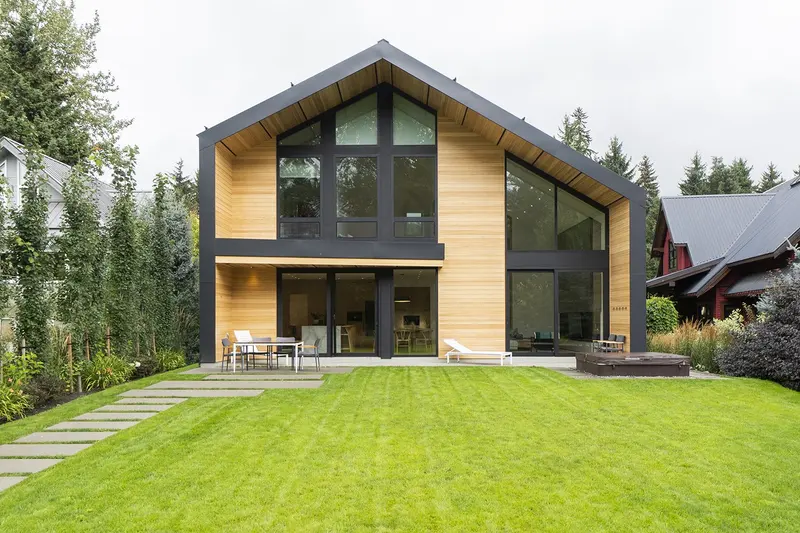 White Gold exterior at twilight — custom home in Whistler by Balmoral Construction