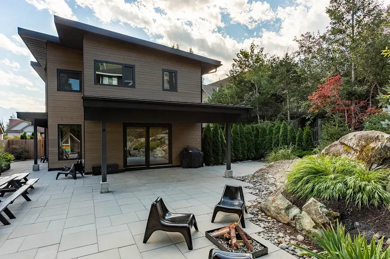 Pinewood fire pit seating area with landscaped grounds