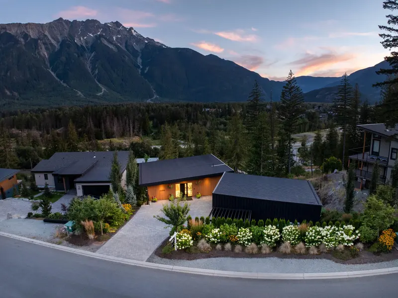 Cerulean exterior at dusk with mountain backdrop, Pemberton
