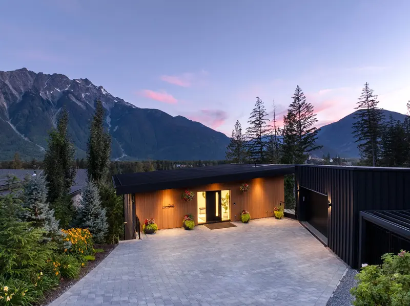Cerulean exterior elevation with contemporary lines and warm lighting