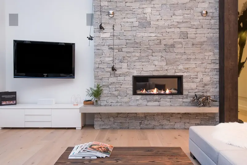 Wedgewoods stone fireplace detail in living room