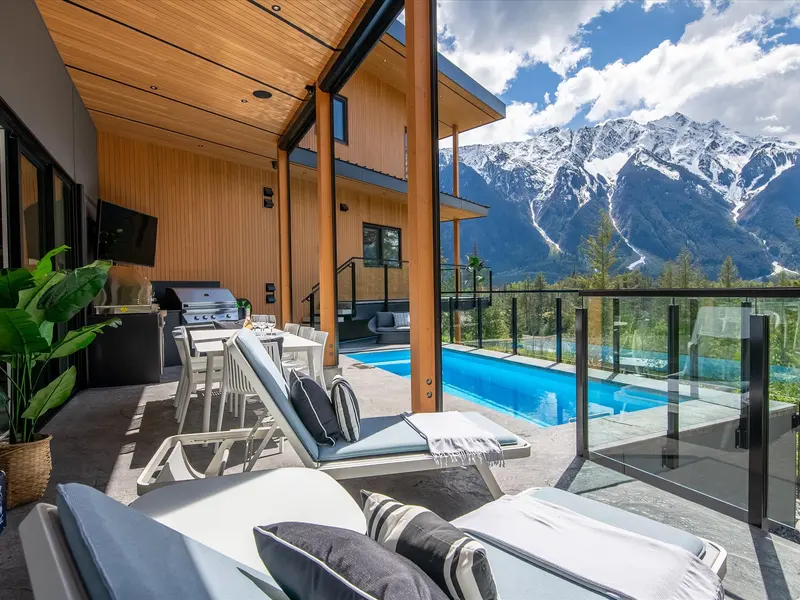 Cerulean open-plan living room with valley views