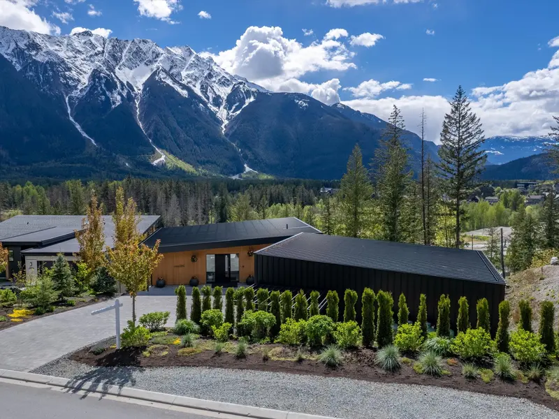 Cerulean kitchen with contemporary finishes and mountain views