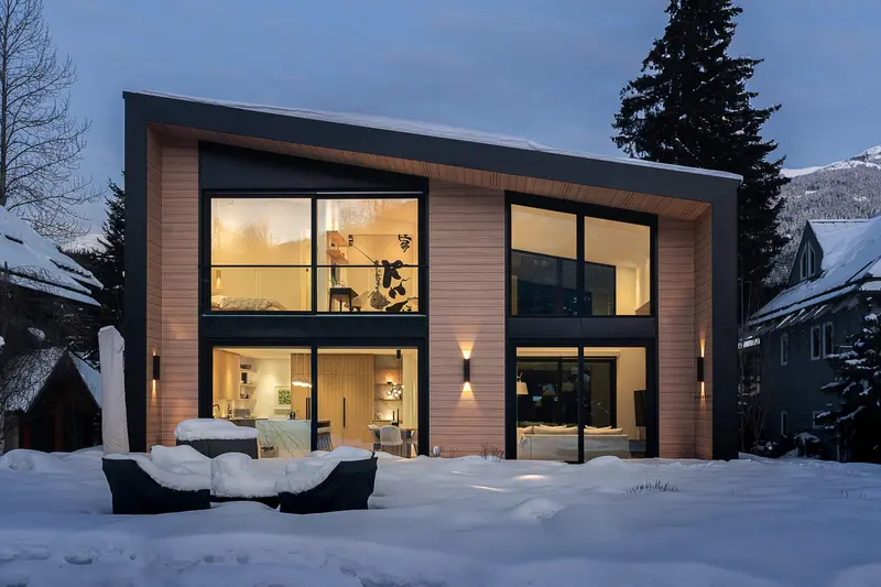 White Gold 2 exterior at twilight — custom home in Whistler by Balmoral Construction